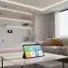 Modern smart home interior with integrated smart devices and central control panel.